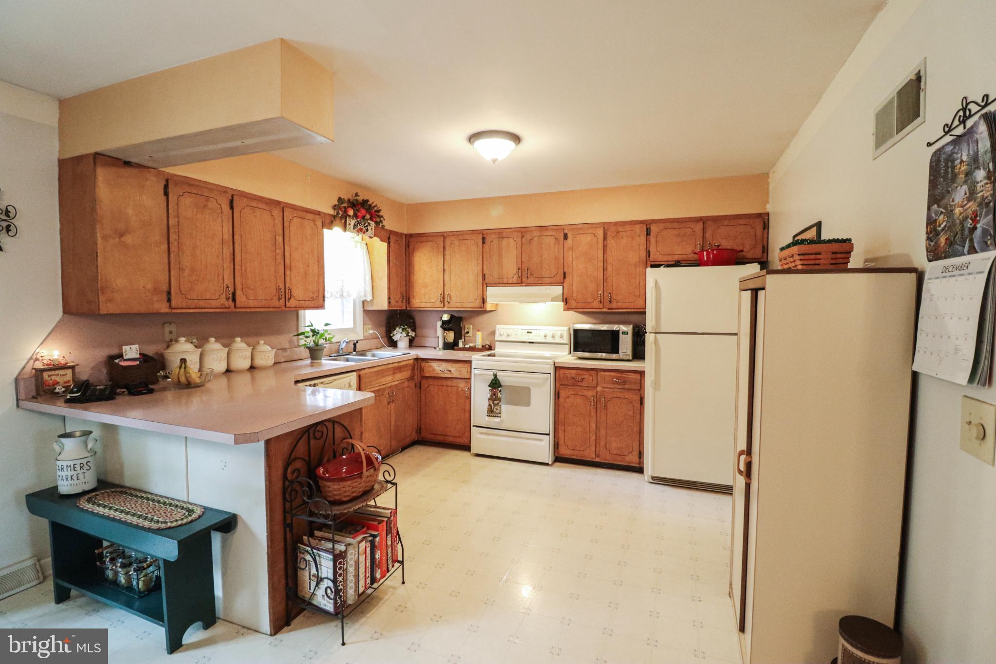 92 Newman Road Orrtanna, PA 17353 - Photo 14 of 42 Warm and inviting kitchen with classic charm.