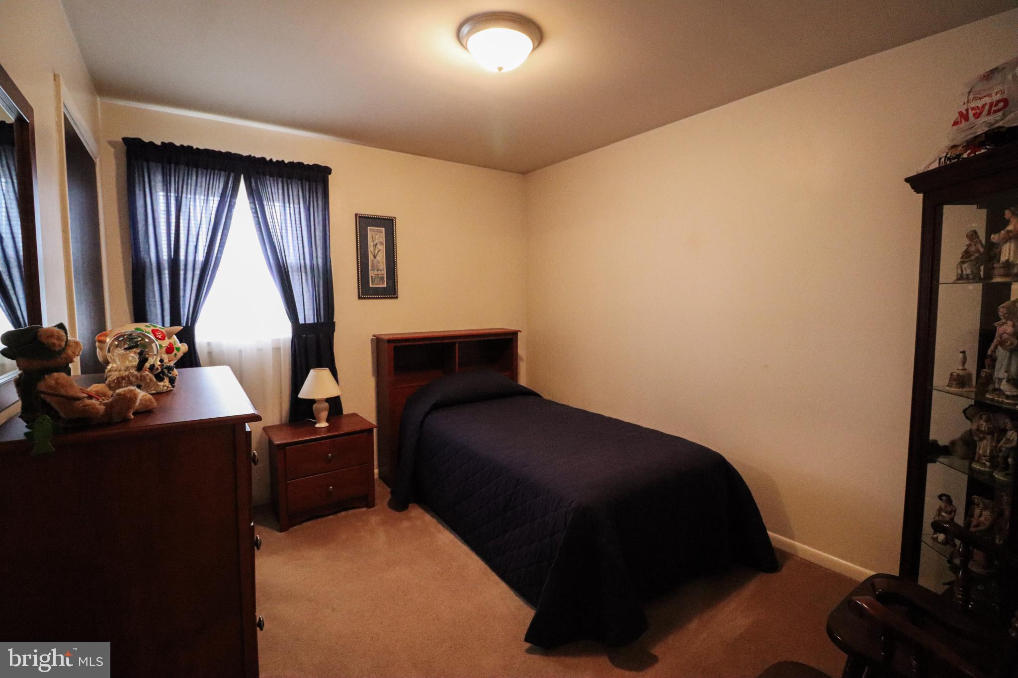 92 Newman Road Orrtanna, PA 17353 - Photo 20 of 42 Cozy bedroom with natural light and charm.