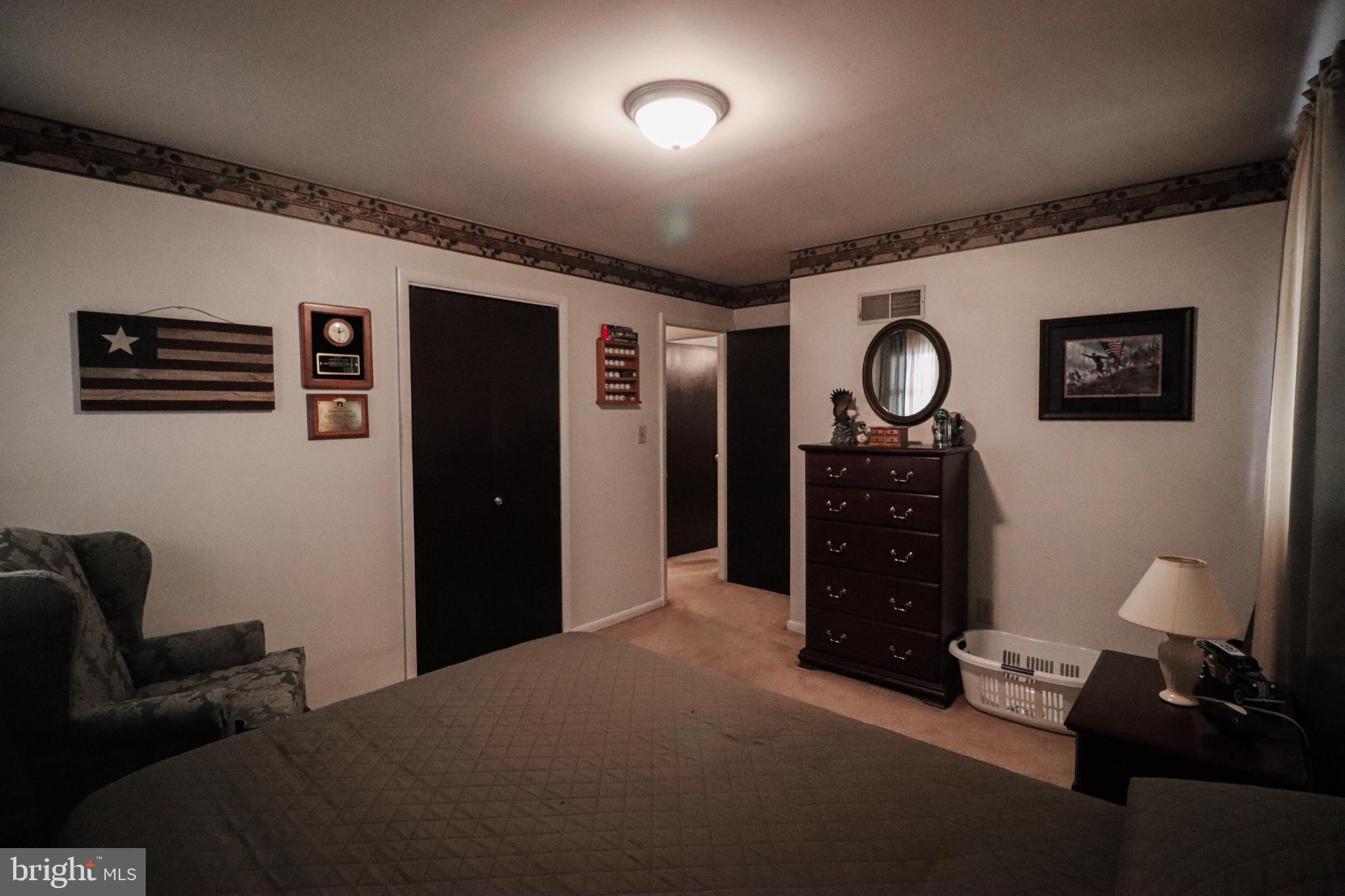 92 Newman Road Orrtanna, PA 17353 - Photo 26 of 42 Cozy bedroom with classic decor accents.