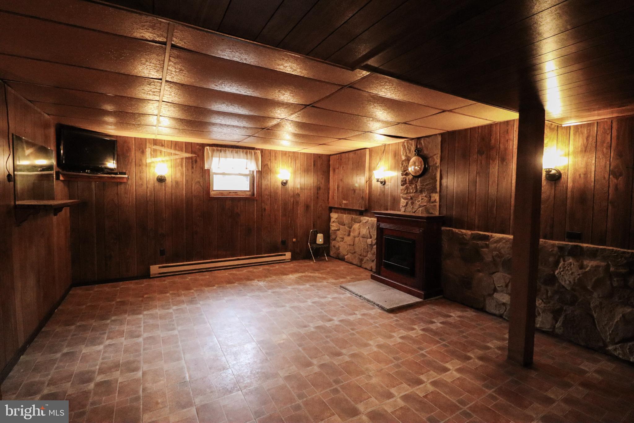 92 Newman Road Orrtanna, PA 17353 - Photo 27 of 42 Cozy, rustic basement retreat awaits you.