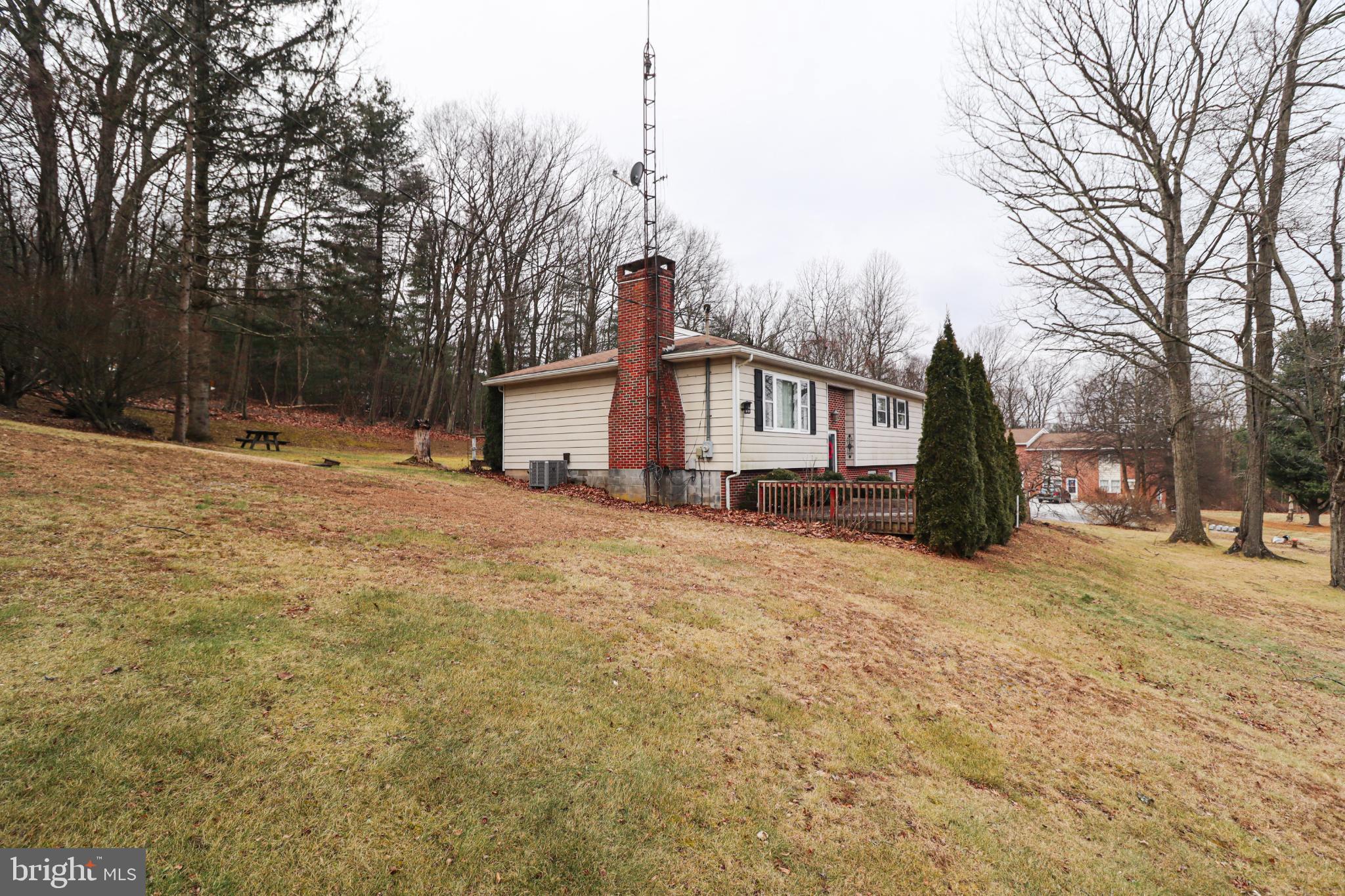 92 Newman Road Orrtanna, PA 17353 - Photo 3 of 42 Charming hillside retreat with serene views.