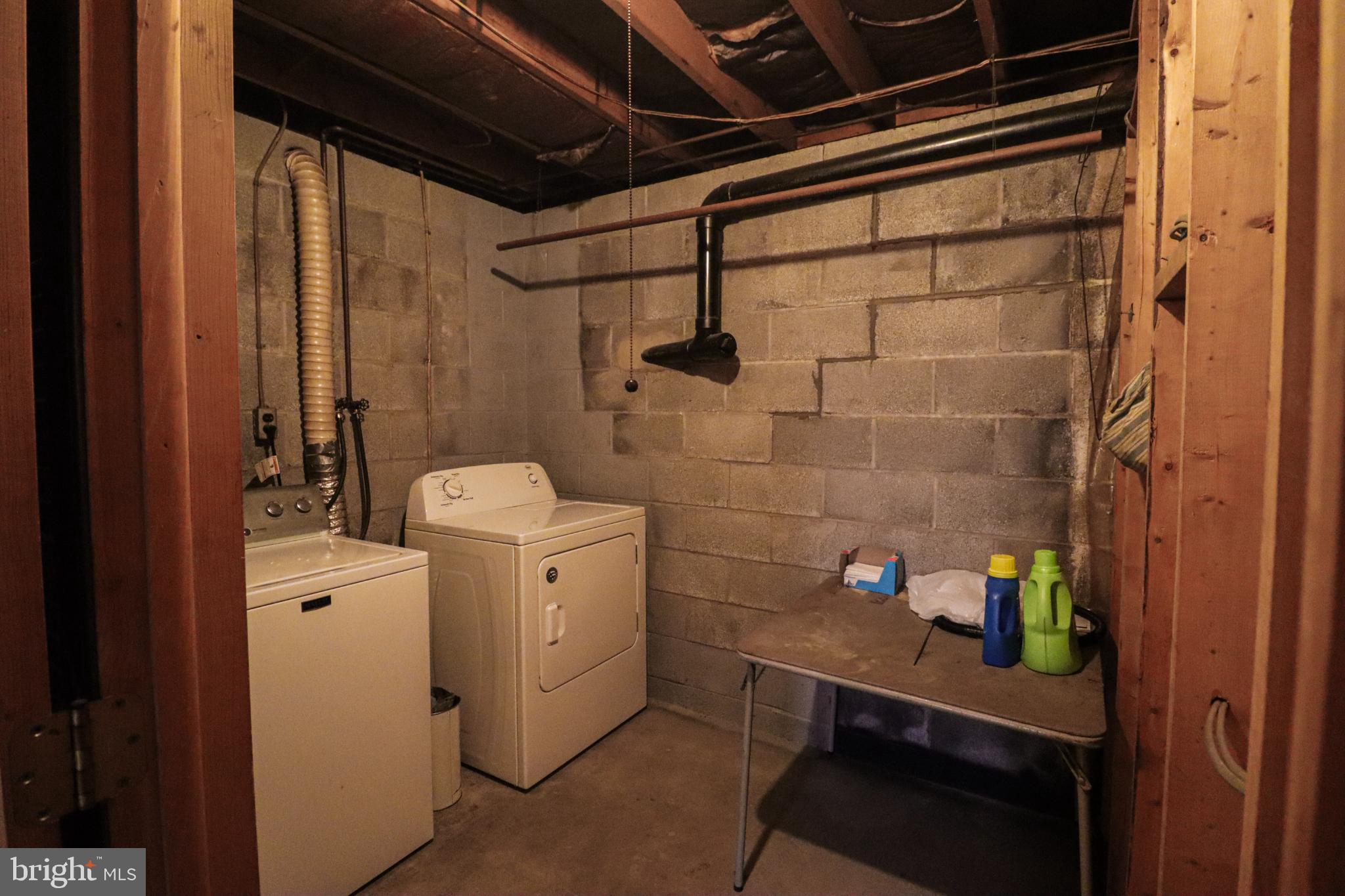 92 Newman Road Orrtanna, PA 17353 - Photo 31 of 42 Functional laundry space with utility features.