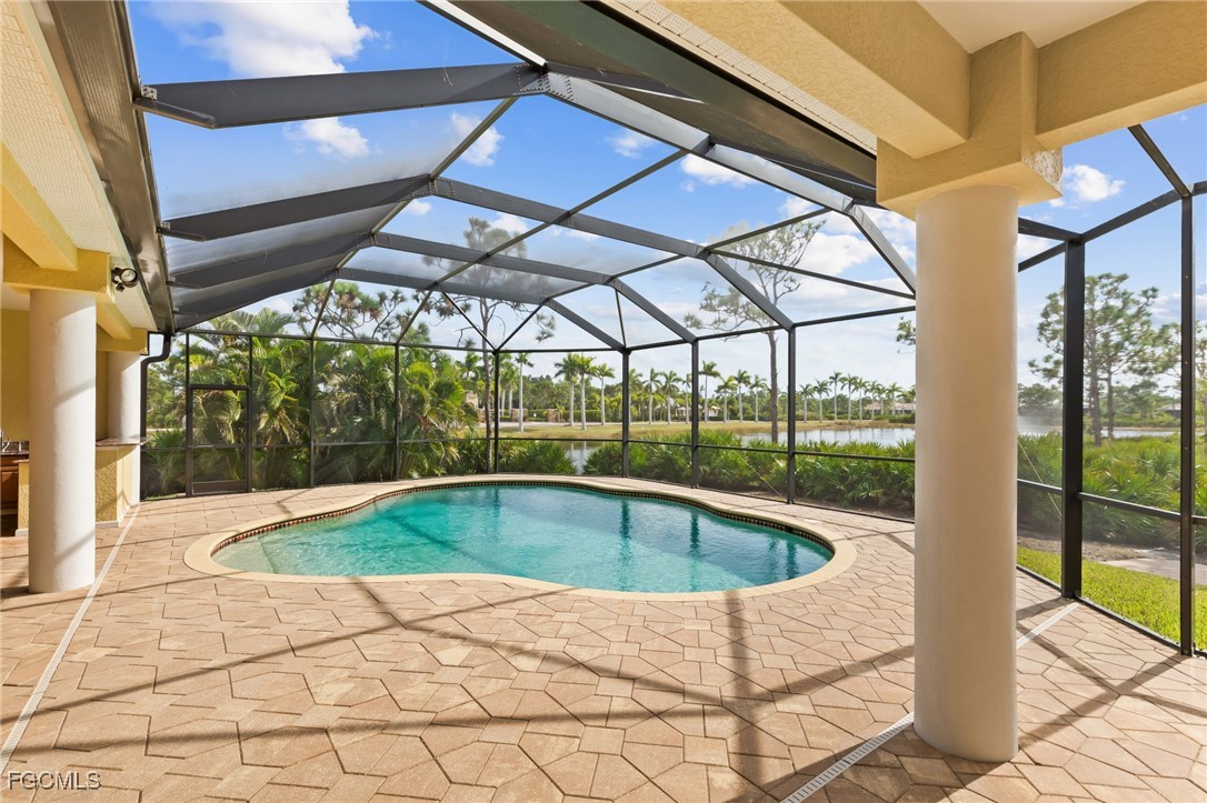 6057 Calusa Rdg Trail Bokeelia, FL 33922 - Photo 30 of 45 a outdoor space with pool and furniture