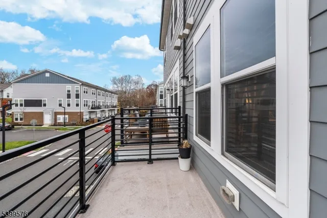 a view of a balcony with city view