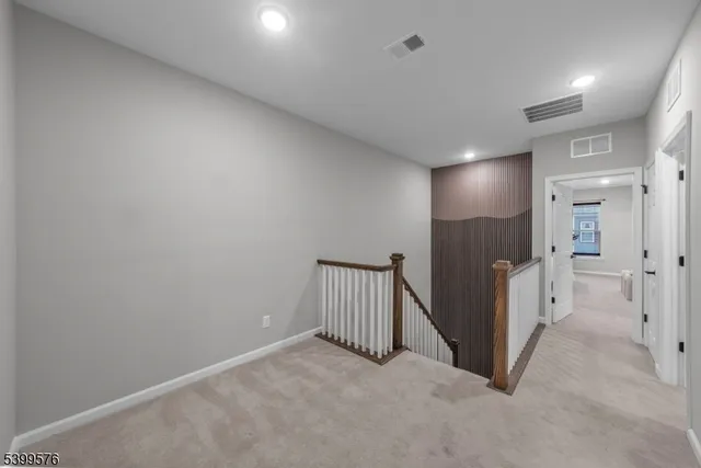 a view of a hallway with entryway