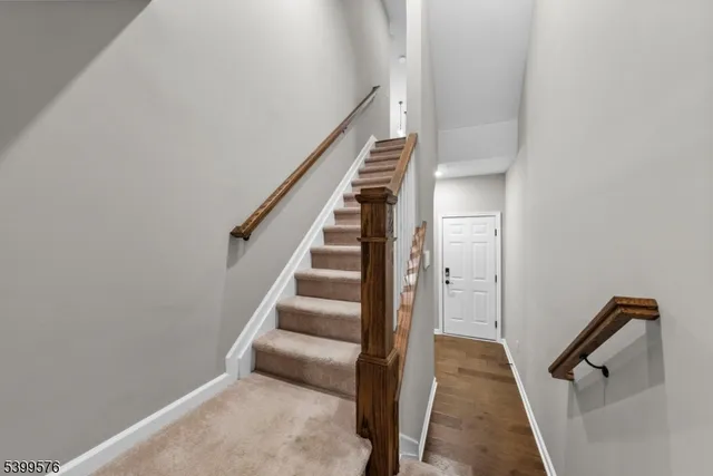 a view of entryway with wooden floor