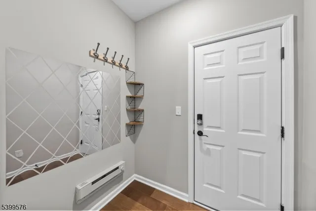 a view of an apartment with a garden