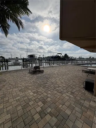 a view of a swimming pool with a terrace