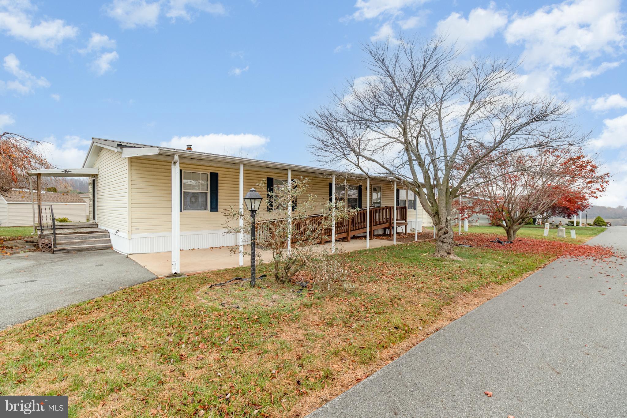 268 David Circle York, PA 17406 - Photo 2 of 26 a view of a house with a yard and large tree