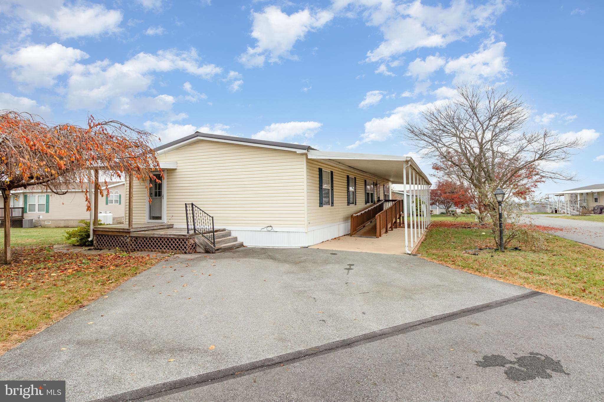 268 David Circle York, PA 17406 - Photo 3 of 26 a front view of a house with a yard and garage