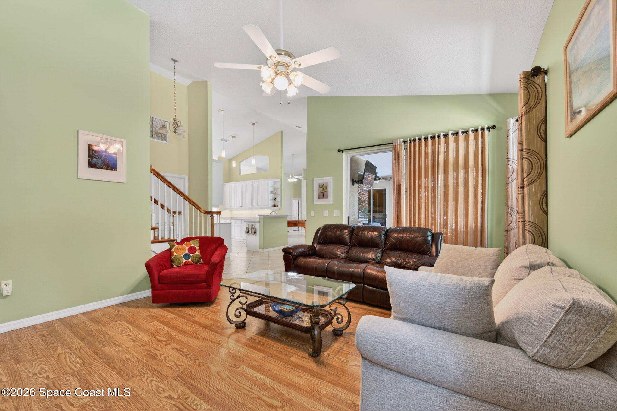 440 Mohawk Trail Merritt Island, FL 32953 - Photo 23 of 86 a living room with furniture and a chandelier