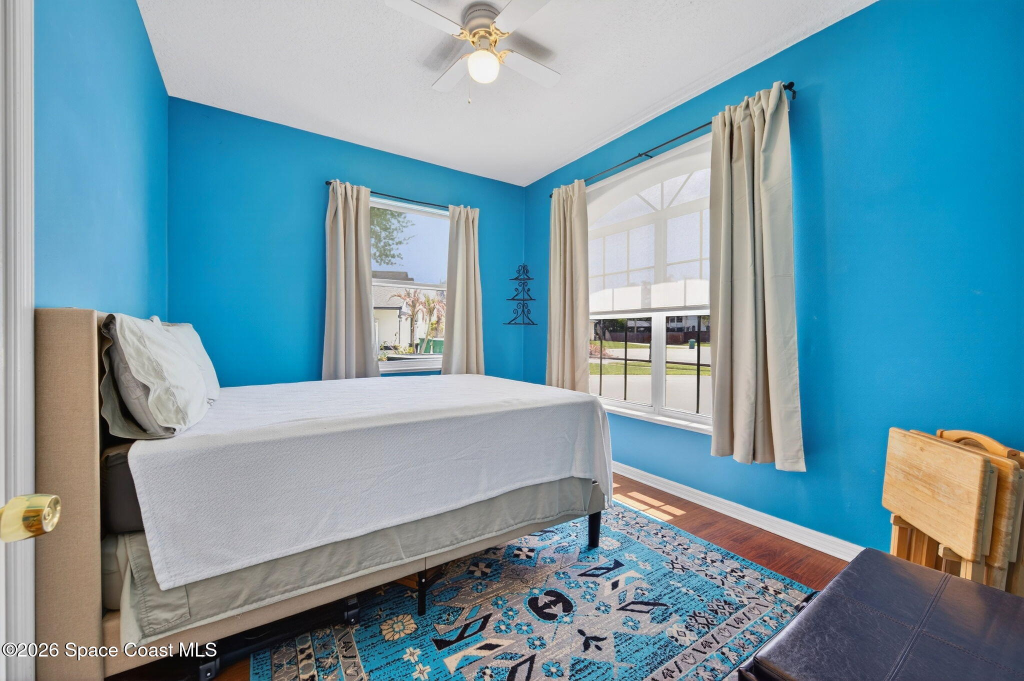 440 Mohawk Trail Merritt Island, FL 32953 - Photo 35 of 86 a large bed sitting in a bedroom next to a window