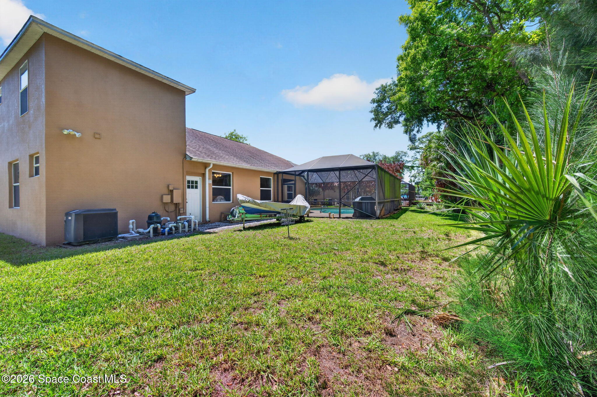 440 Mohawk Trail Merritt Island, FL 32953 - Photo 57 of 86 front view of a house with a yard