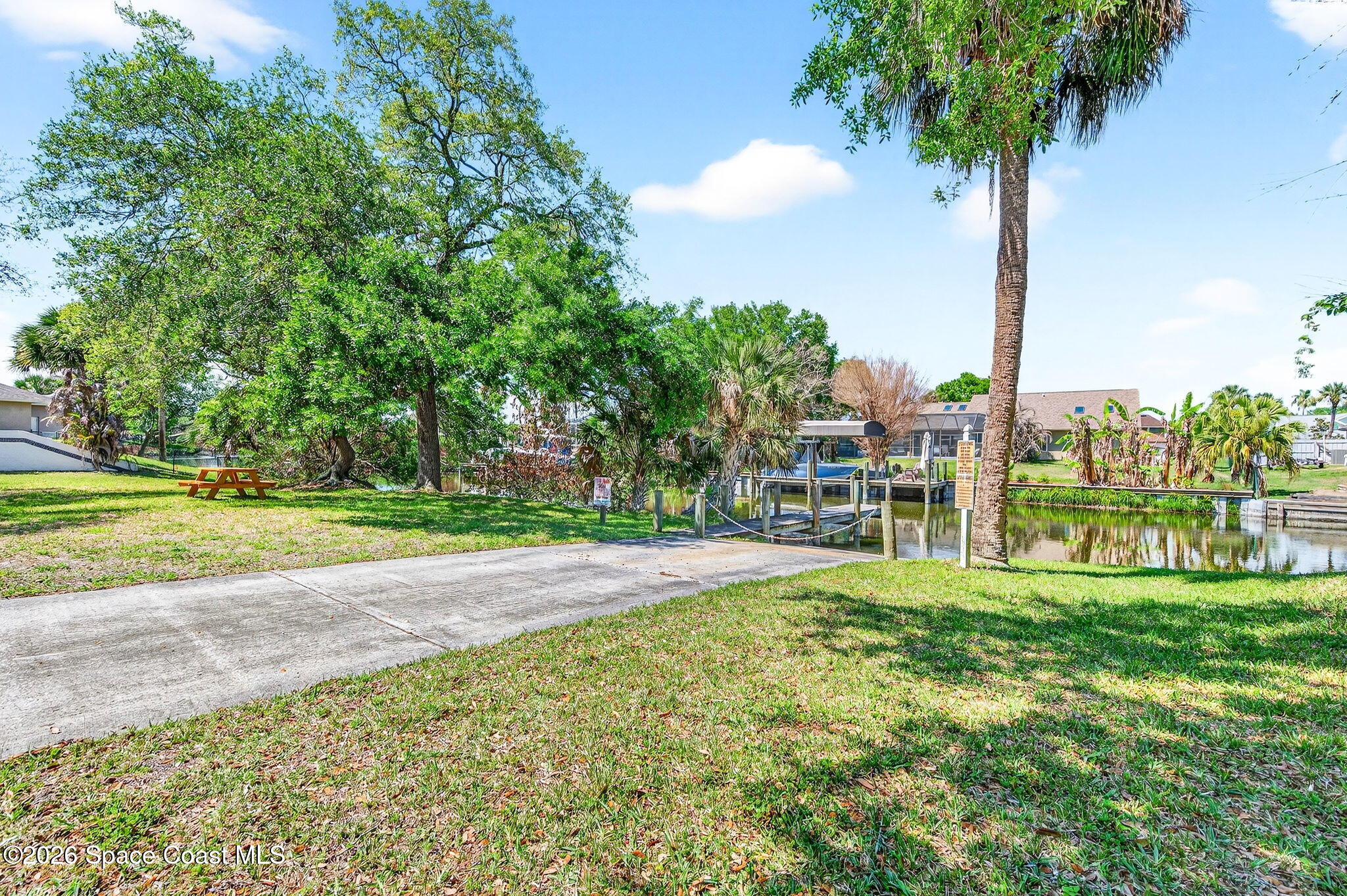440 Mohawk Trail Merritt Island, FL 32953 - Photo 64 of 86 a view of a park with big trees