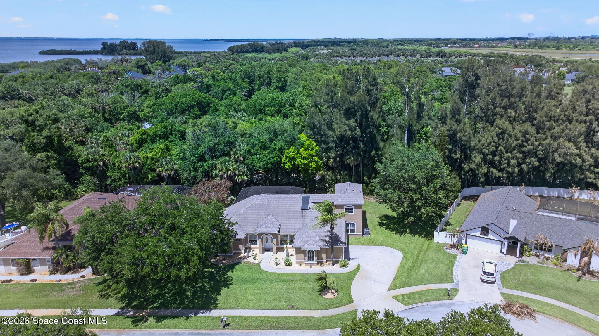 440 Mohawk Trail Merritt Island, FL 32953 - Photo 72 of 86 an aerial view of a house with garden space and street view