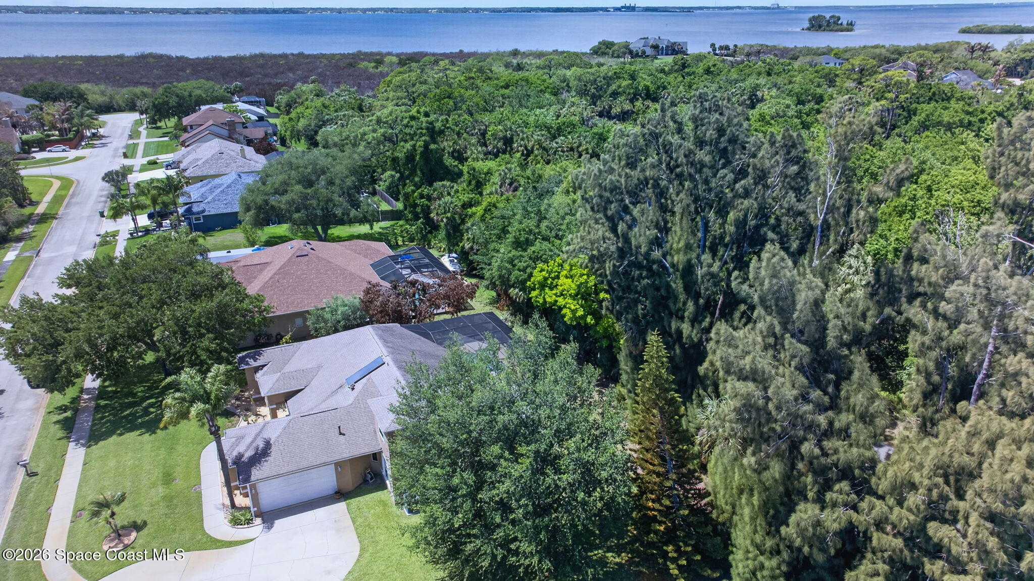440 Mohawk Trail Merritt Island, FL 32953 - Photo 74 of 86 an aerial view of a house with a yard