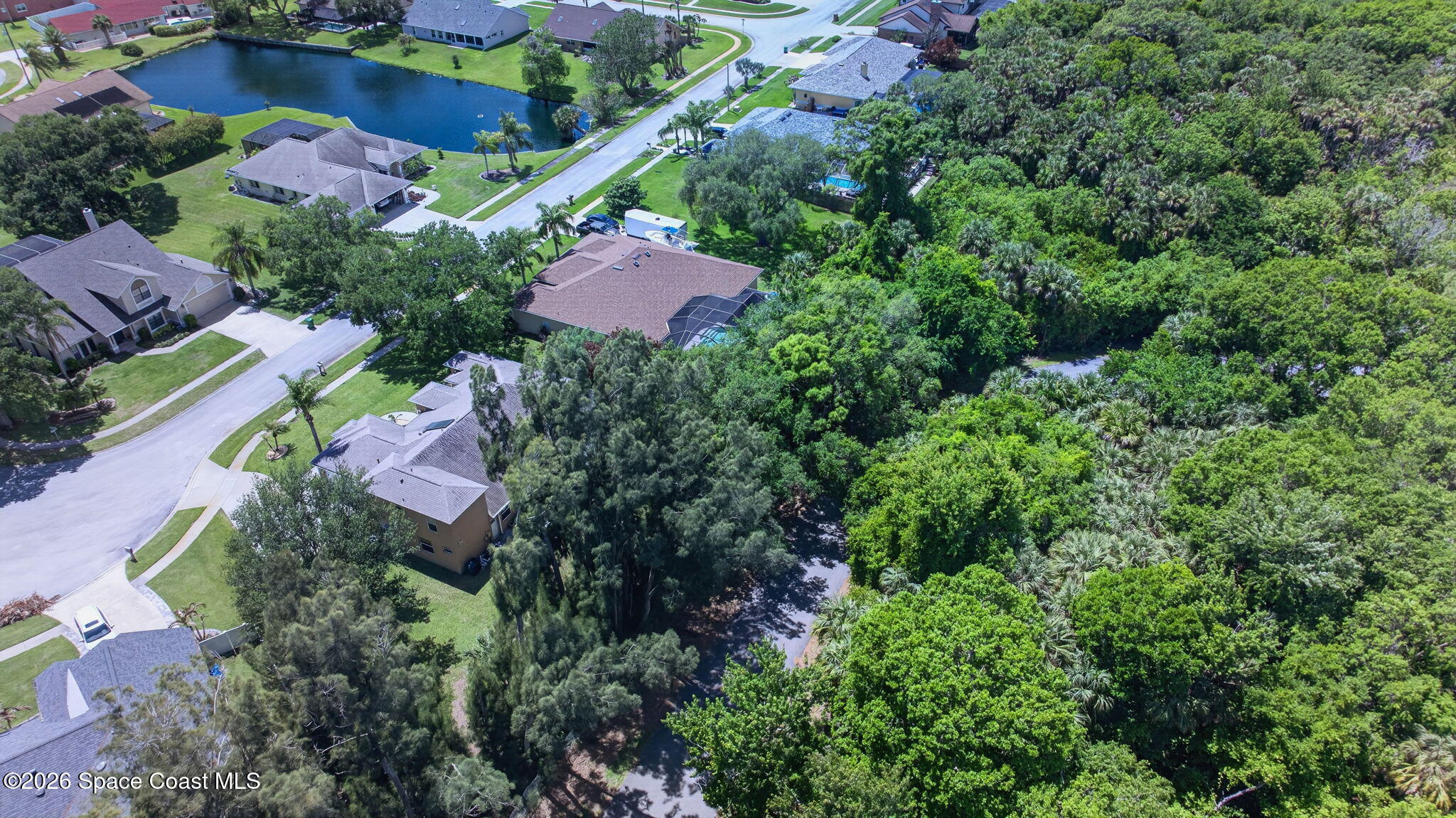 440 Mohawk Trail Merritt Island, FL 32953 - Photo 75 of 86 an aerial view of house with yard