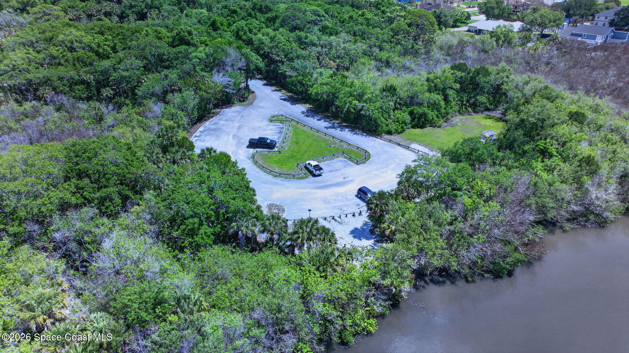 440 Mohawk Trail Merritt Island, FL 32953 - Photo 82 of 86 an aerial view of a house with yard swimming pool and outdoor seating