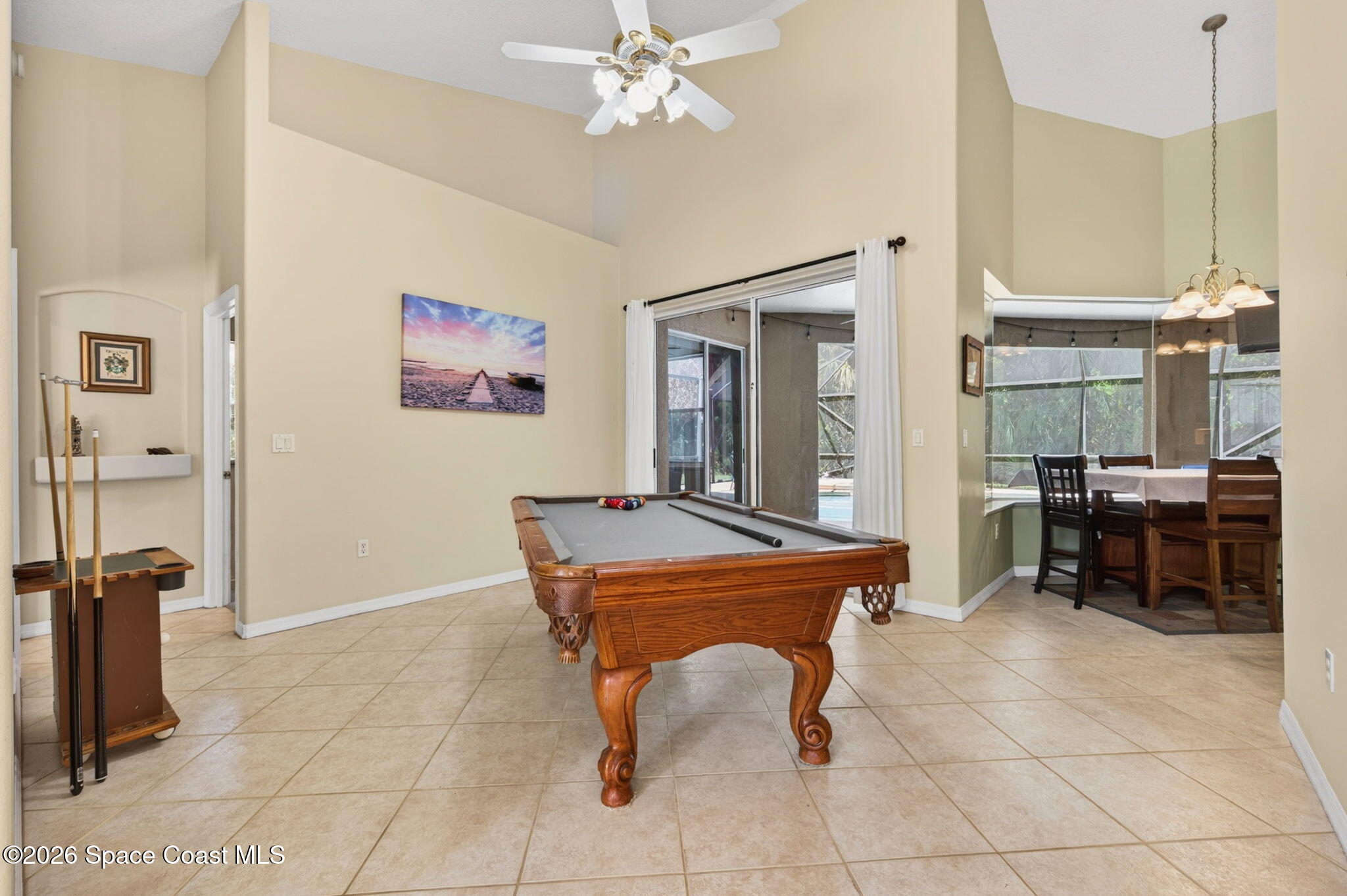 440 Mohawk Trail Merritt Island, FL 32953 - Photo 9 of 86 a room with furniture a desk and chair