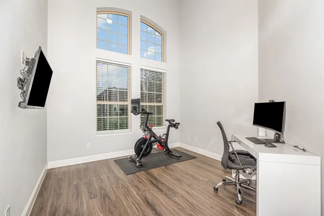 a kitchen with stainless steel appliances granite countertop a stove microwave and cabinets
