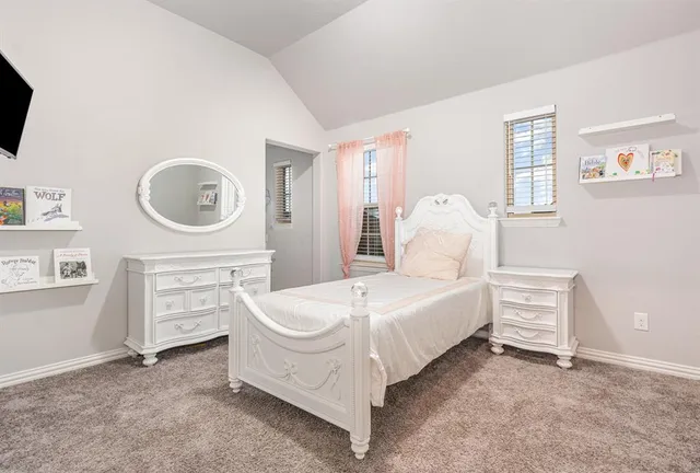 a bathroom with a shower a toilet and sink