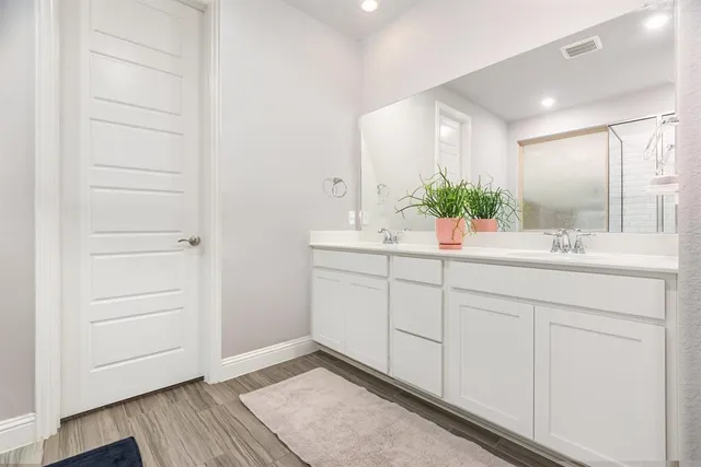 a bed room with a bed and a window