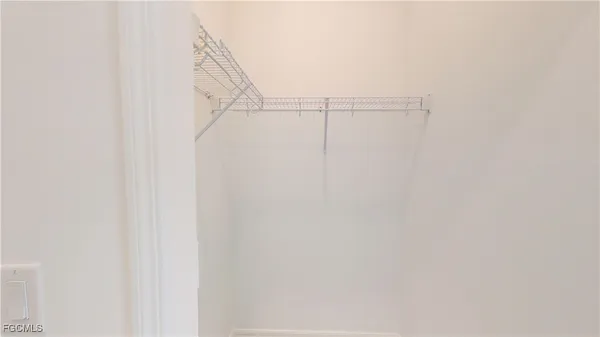 a view of small space with racks on the wall