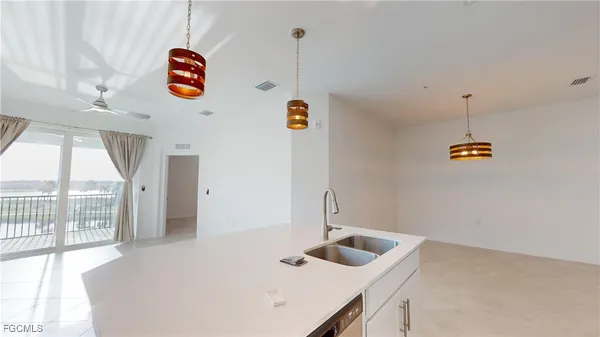 a bathroom with a sink and a window