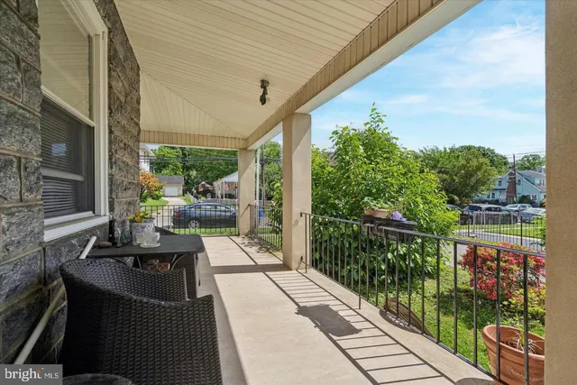 a view of balcony with furniture