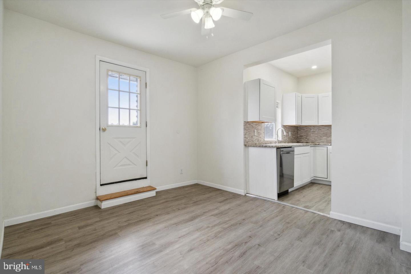 660 Loraine Street, Unit 2 Ardmore, PA 19003 - Photo 7 of 16 a view of kitchen with wooden floor and window