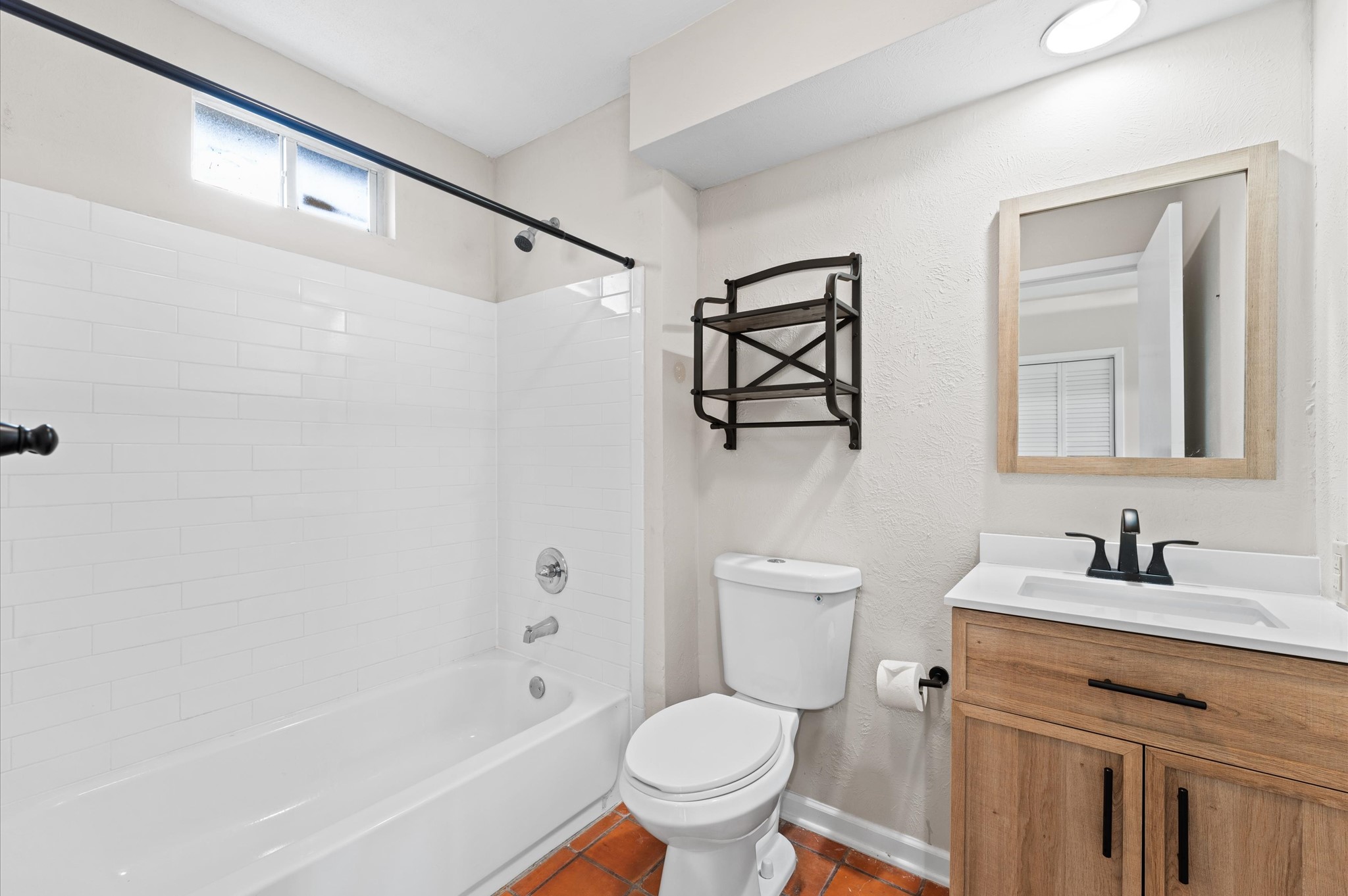 9407 Brooding Oak Circle Houston, TX 77096 - Photo 30 of 43 a bathroom with a sink toilet and shower