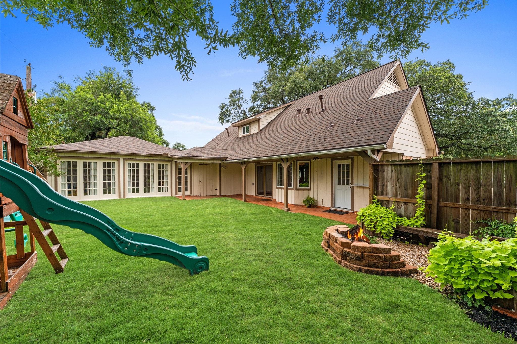 9407 Brooding Oak Circle Houston, TX 77096 - Photo 34 of 43 a front view of a house with garden
