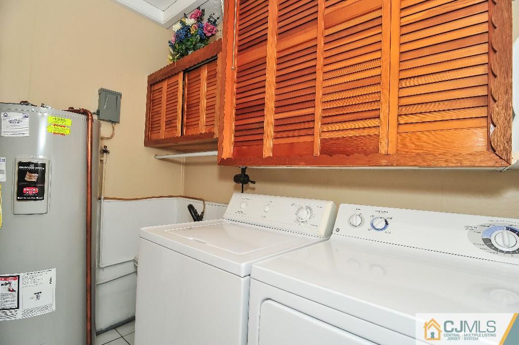 20 Roger Road Edison, NJ 08817 - Photo 14 of 25 a utility room with dryer and washer