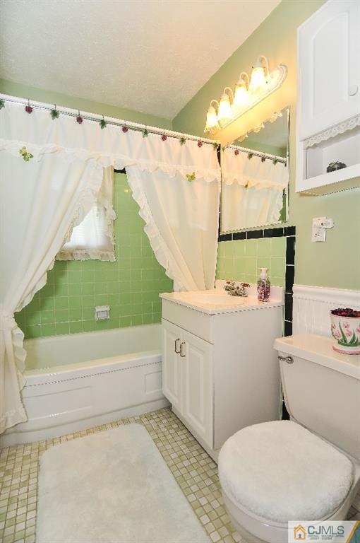 20 Roger Road Edison, NJ 08817 - Photo 15 of 25 a bathroom with a sink a toilet and bathtub
