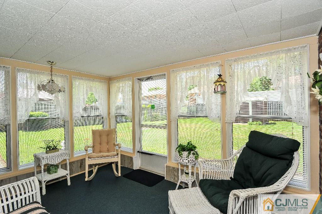 20 Roger Road Edison, NJ 08817 - Photo 18 of 25 a living room with furniture and a large window