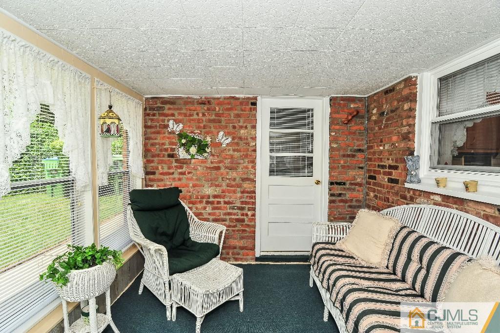 20 Roger Road Edison, NJ 08817 - Photo 20 of 25 a living room with furniture fireplace and a flat screen tv
