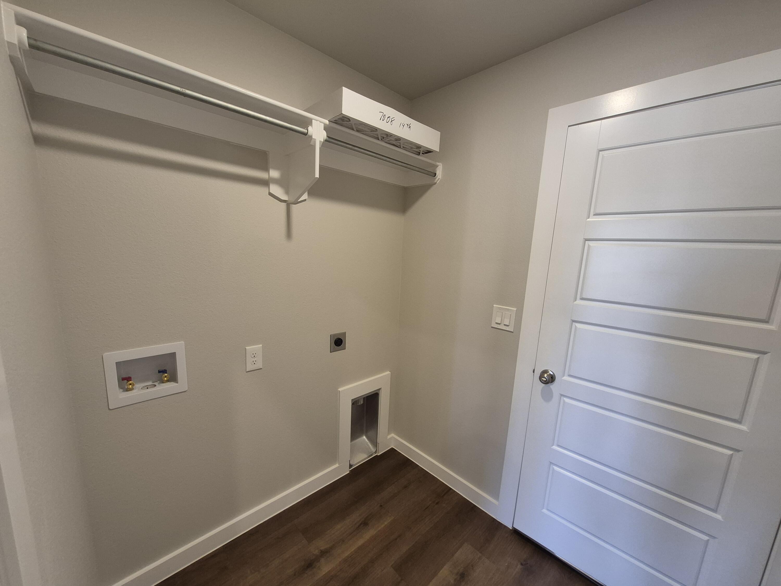 7008 14th Street Lubbock, TX 79416 - Photo 9 of 21 a view of walk in closet with empty racks