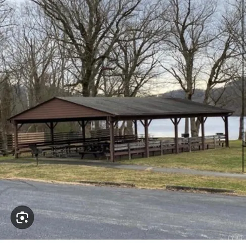 a view of a lake with a outdoor space