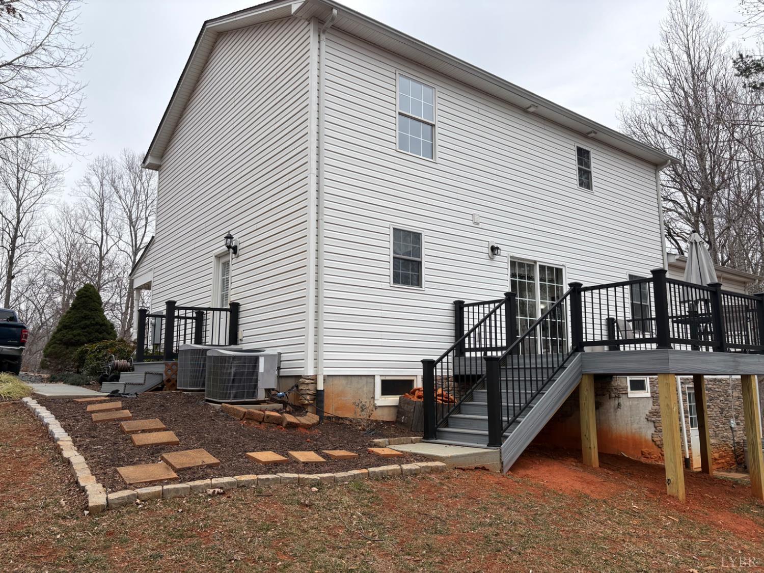 324 Ruth Drive Madison Heights, VA 24572 - Photo 4 of 31 New deck installed in the fall of 2025 with Trex decking