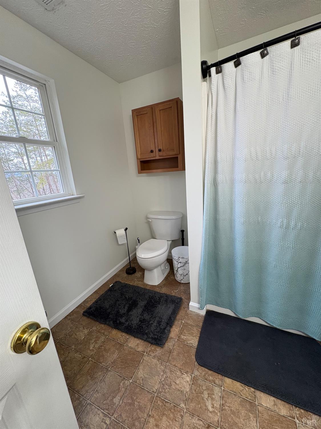 324 Ruth Drive Madison Heights, VA 24572 - Photo 7 of 31 Bath off primary bedroom on first floor.