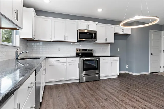 $392,000 | 11222 North Oak Trafficway, Kansas City, MO 64155