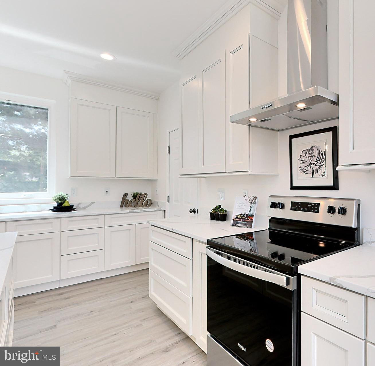 6430 Franconia Road Springfield, VA 22150 - Photo 6 of 21 Similar kitchen, Shaker Cabinets, quartz counters