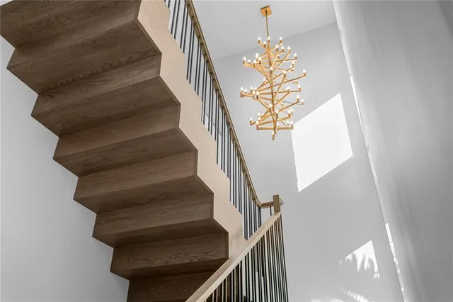 a bathroom with a sink a toilet and shower curtain