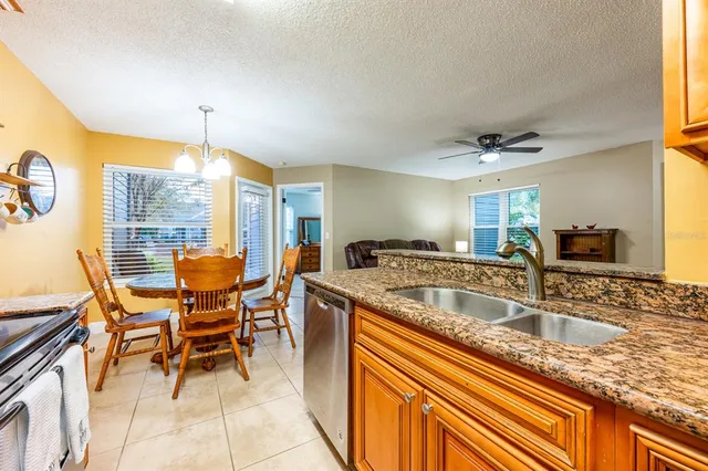 a bedroom with bed and window
