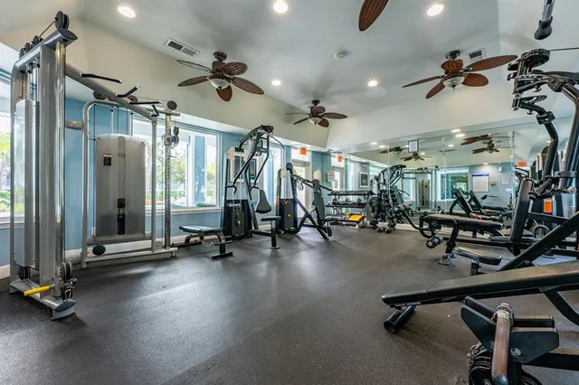 a view of a lake with houses in the back