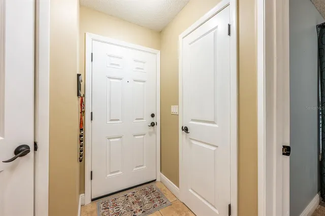 a view of bathroom with a shower and a sink