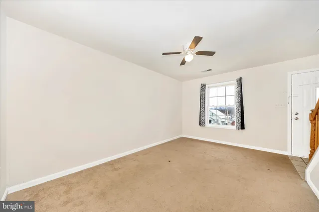 a view of a kitchen with a sink cabinets and a window