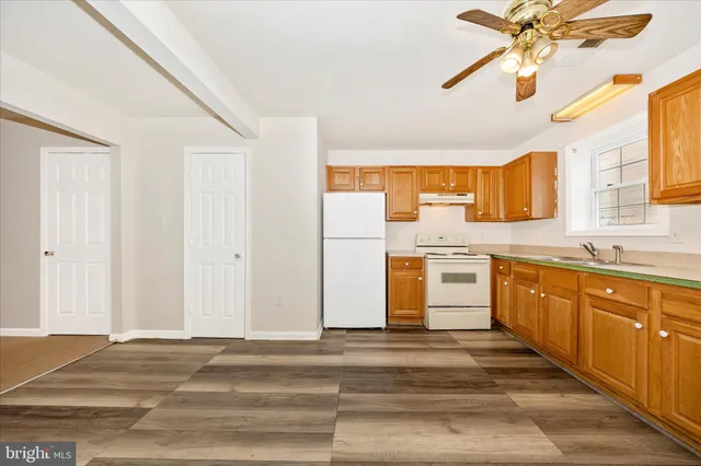 a view of a room that has a washer and dryer