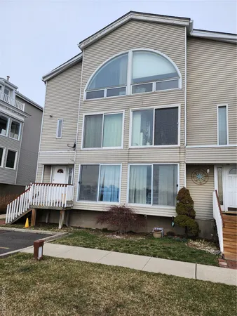a front view of a house with a porch