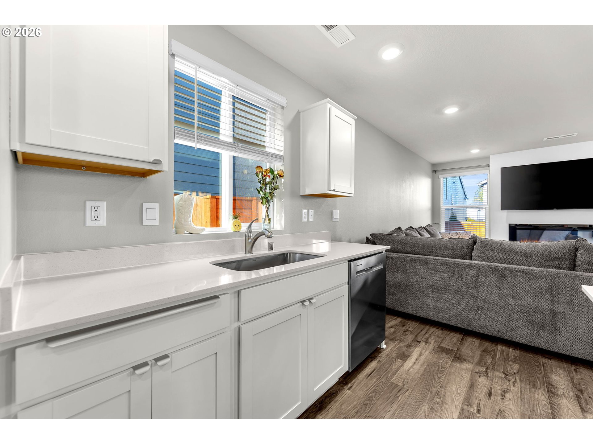 2936 North 3rd Way Ridgefield, WA 98642 - Photo 14 of 44 a living room with furniture and a flat screen tv